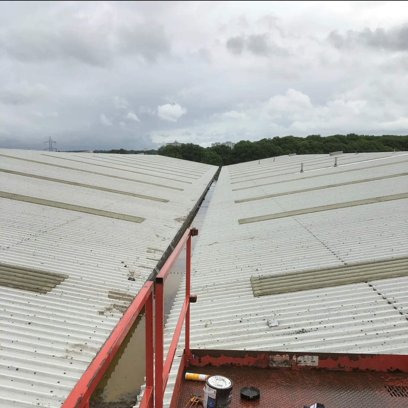 Industrial roof survey Scotland checking gutters and outlets