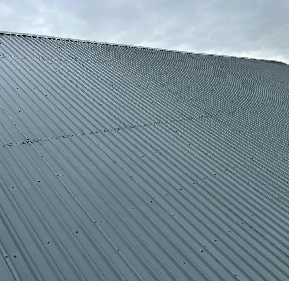 Industrial roof refurbishment Scotland metal roof in Merlin grey